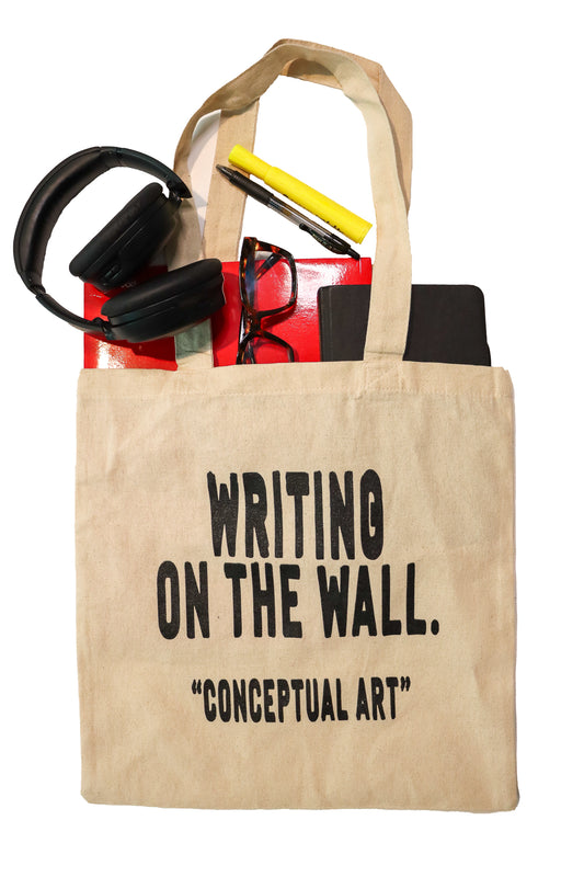 Writing on the wall tote bag